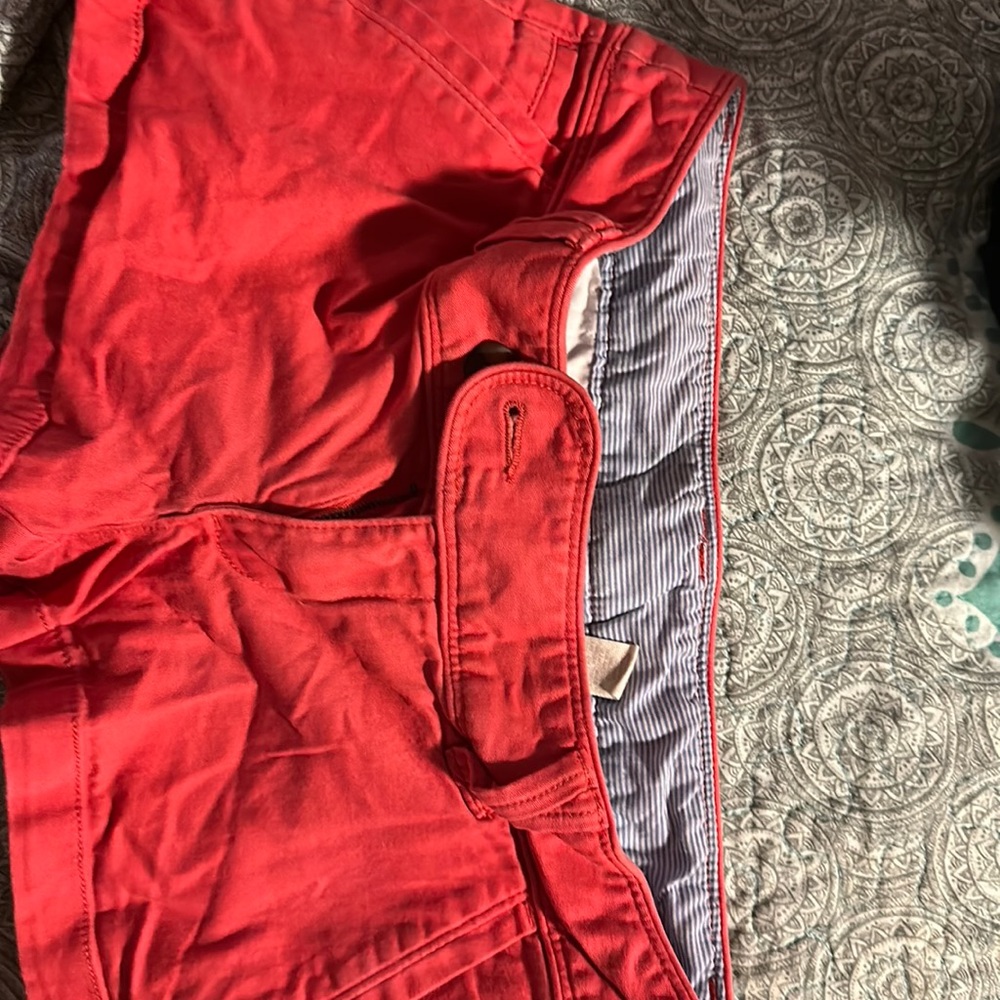 This is eight pair of red camel shorts all size 3